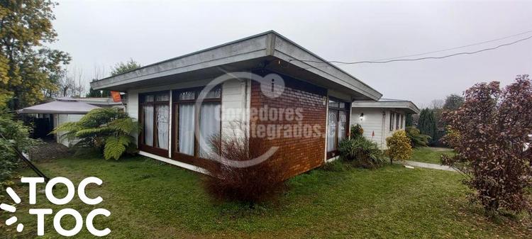 Venta Casa con Oficinas sector comercial Isla Teja Valdivia